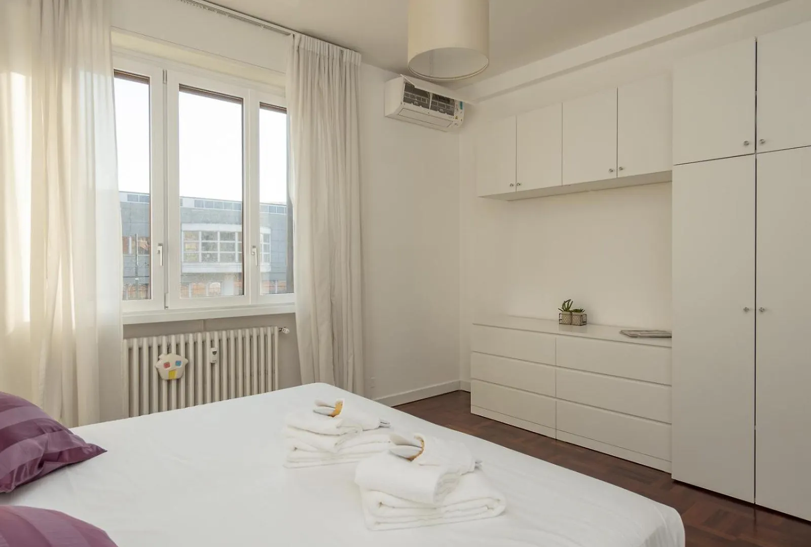 Apartment Modern 3 Bedroom With Balcony Steps From San Siro By Rentopolis Milan